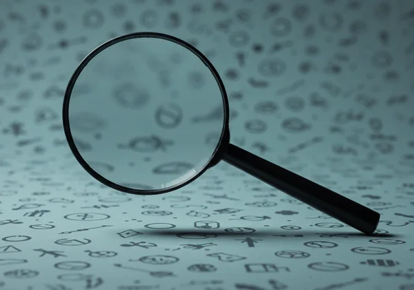Magnifying glass highlights subtle, overlooked ADHD symptoms.